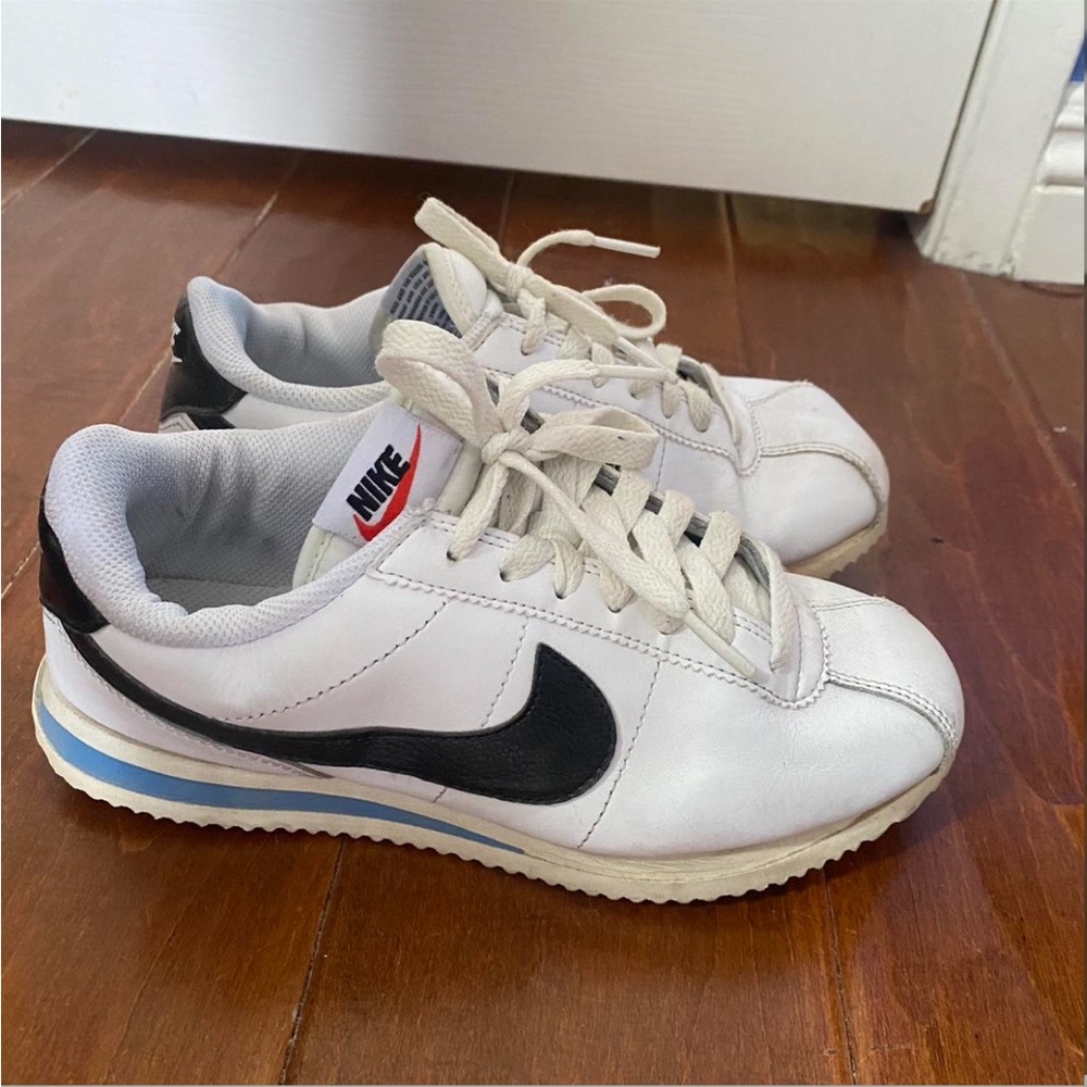 Nike cortez White and Black Sneakers with Blue Accent